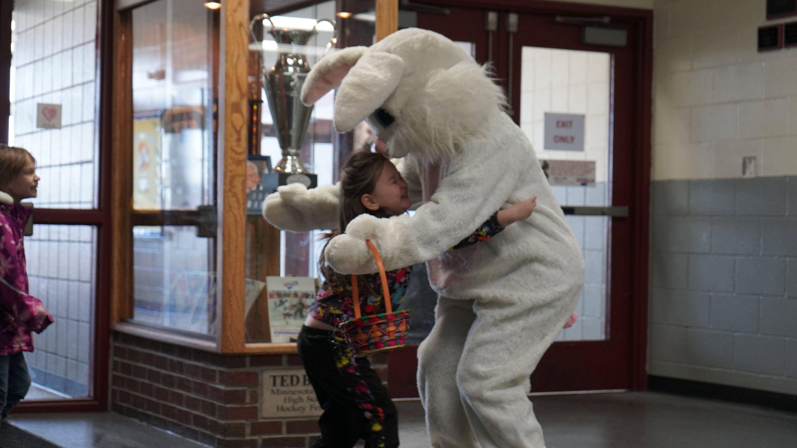Small child hugging the Easter Bunny