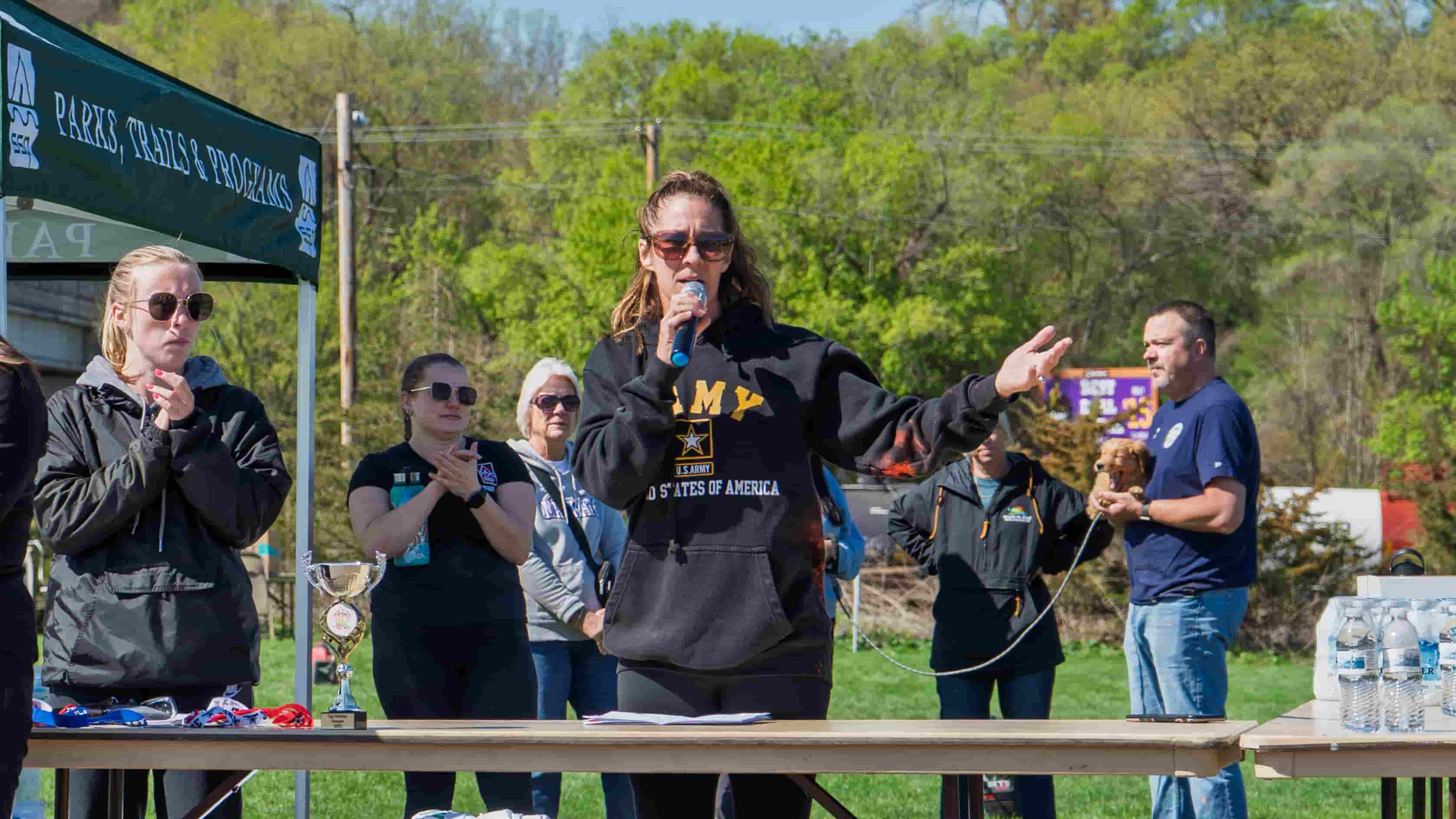 MC on stage addressing the audience