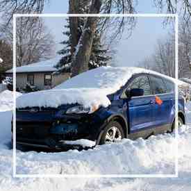 Car covered in snow